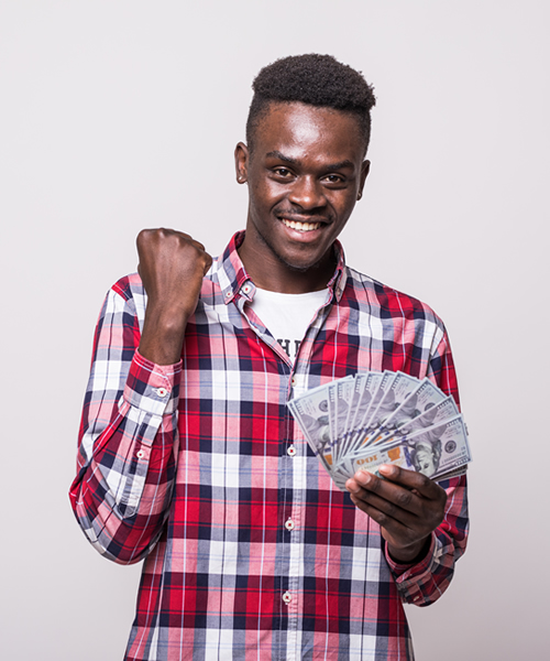 african man holding money 2 Commercial Trust Bank